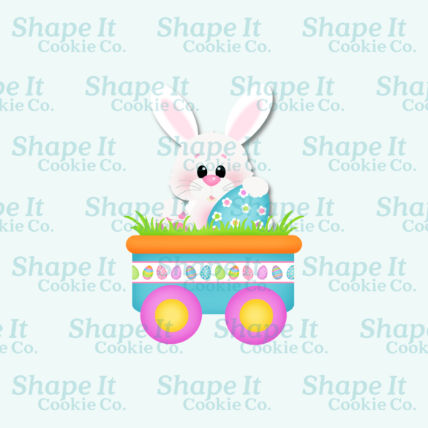Bunny with egg inside a cart with grass cookie cutter image for Shape It Cookie Co.