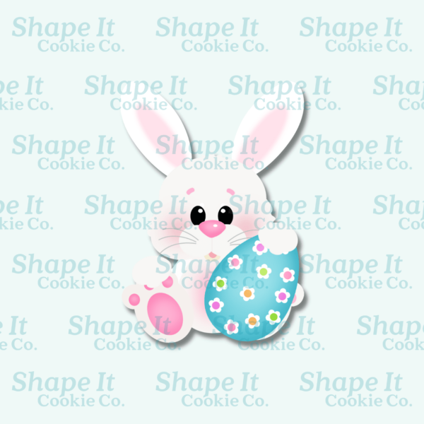 Bunny holding large egg cookie cookie cutter image for Shape It Cookie Co.
