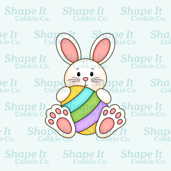 Easter bunny holding rainbow egg cookie cutter image for Shape It Cookie Co.